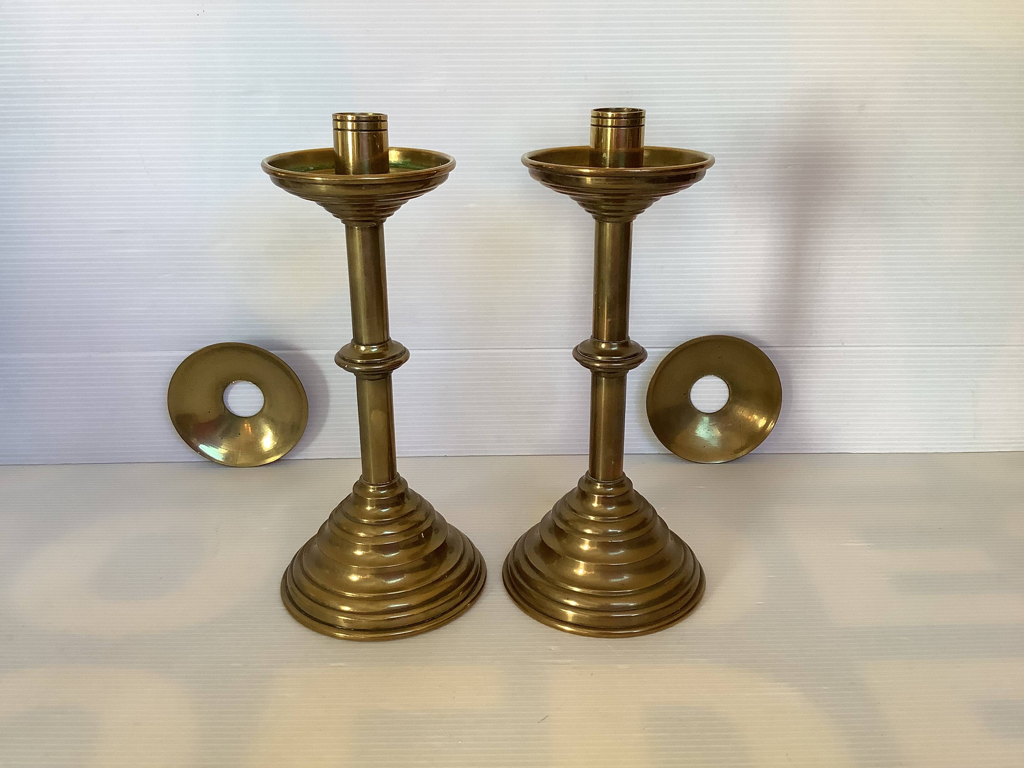 Pair of tulip foot candlesticks in brass