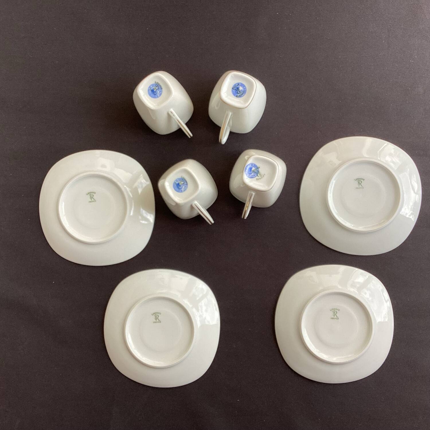Cups and saucers fine porcelain Raynaud