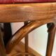 Paire de tabourets de bistrot en bois tourné et assise en skaï rouge XX siècle