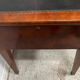 Louis XVI style flat desk in walnut and veneer, 19th century.
