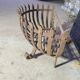 Wrought iron log holder in the shape of a semicircle - 20th century