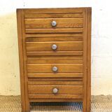 Old blond wooden chiffonnier