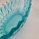 Vintage blue-green turquoise plate in cut and relief glass.