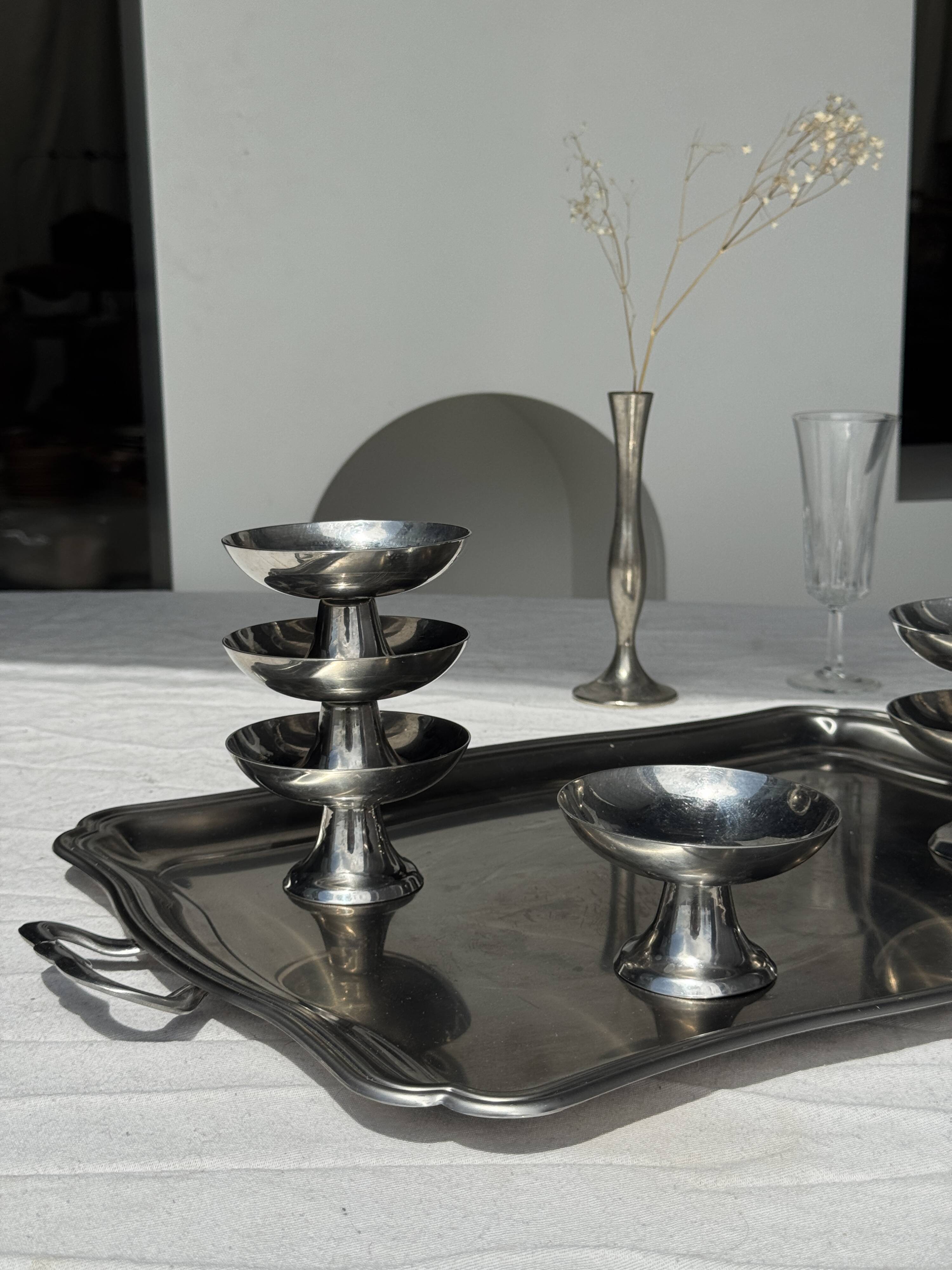 Guy Degrenne silver stainless steel serving tray with an eventful shape