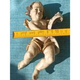 Golden white wooden cherub