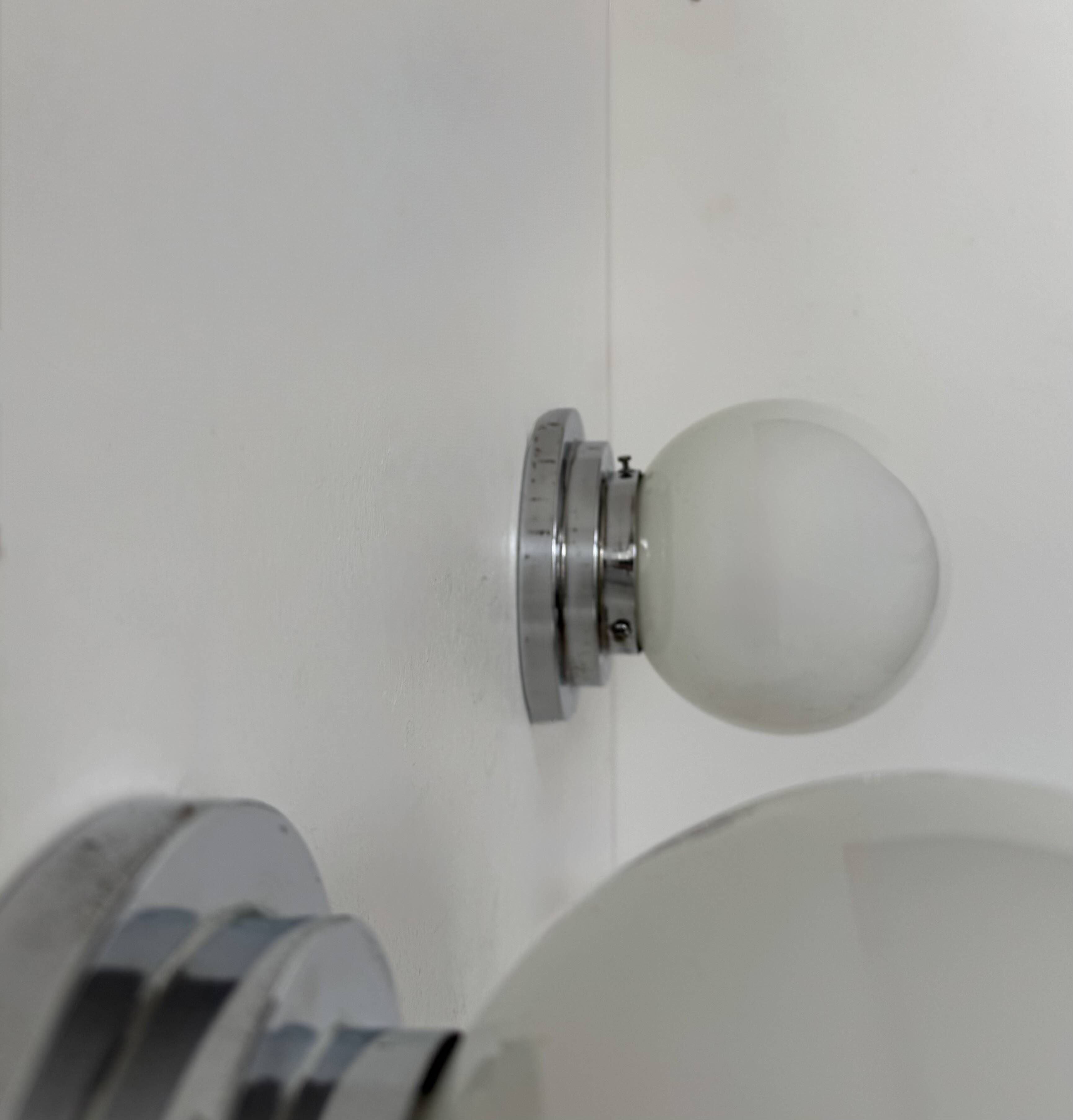 Pair of vintage modernist Art Deco wall lights, chrome and opaline, France