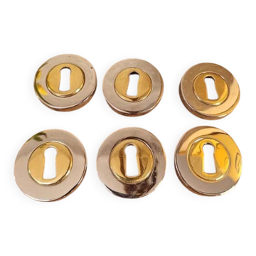 Rare vintage metal door lock fittings in gold and silver.