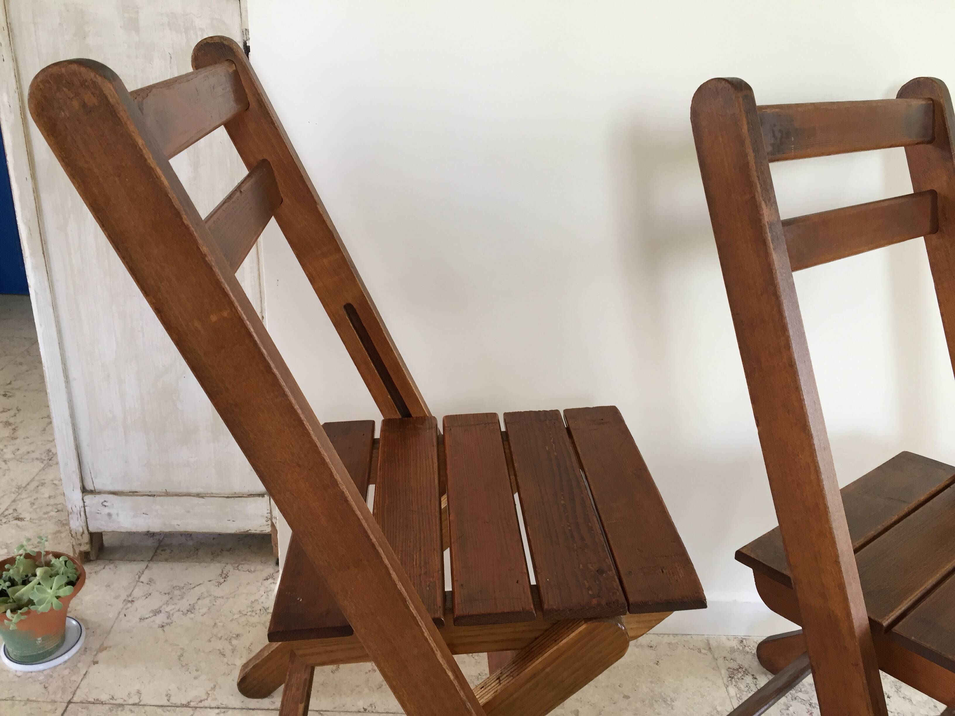 Folding chairs "by the wood fire"