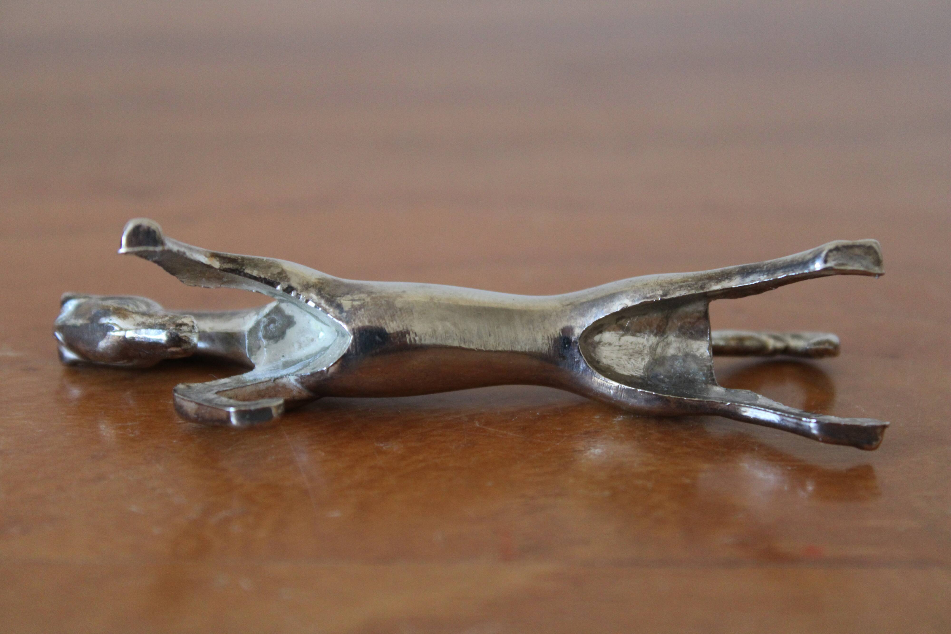 Set of 12 vintage knife rests, in silver metal