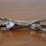 Set of 12 vintage knife rests, in silver metal