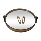 Old round mirror of the 1970s in glass and plexi