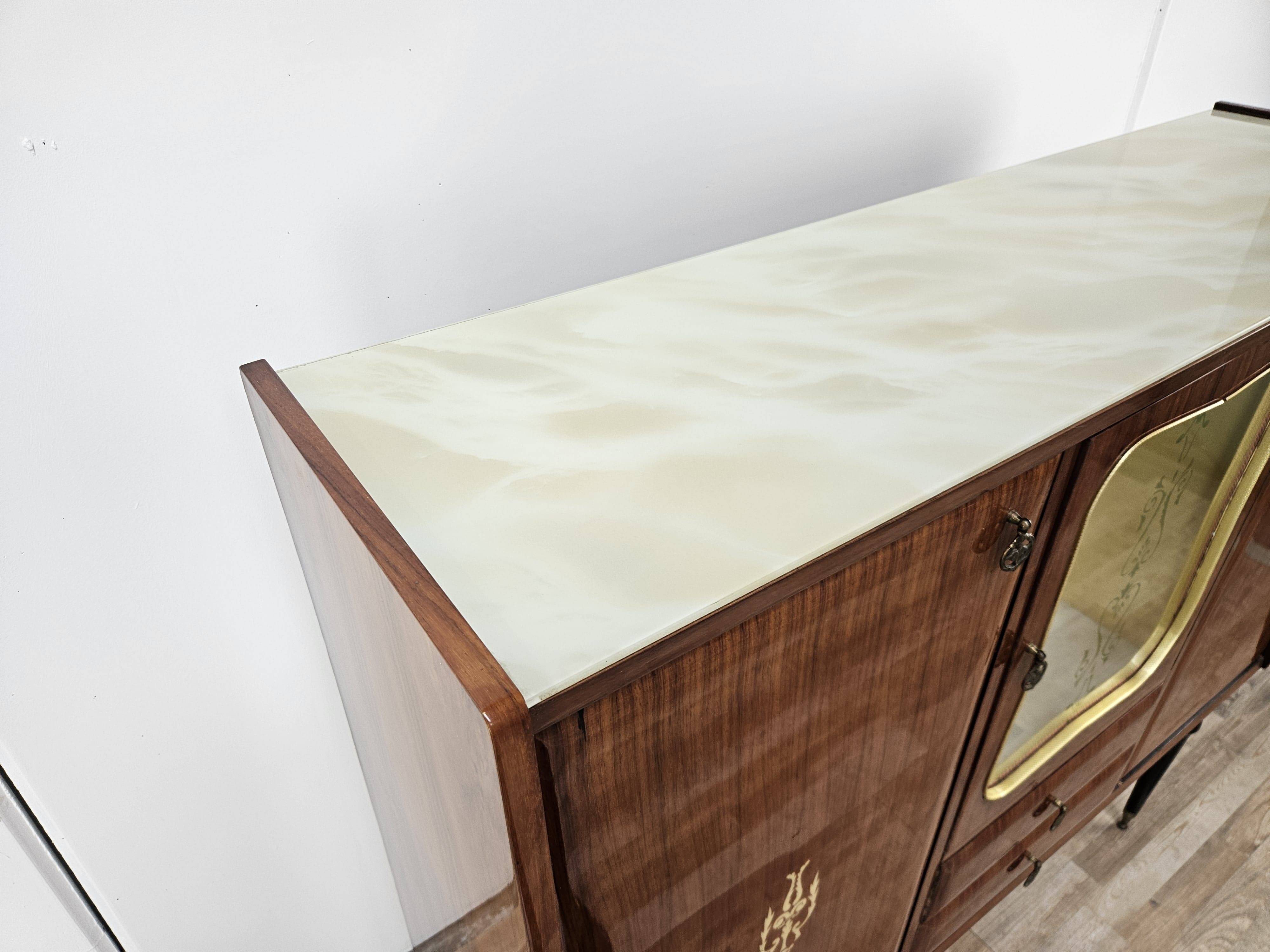 Mid-century 1960s mahogany showcase with glass top