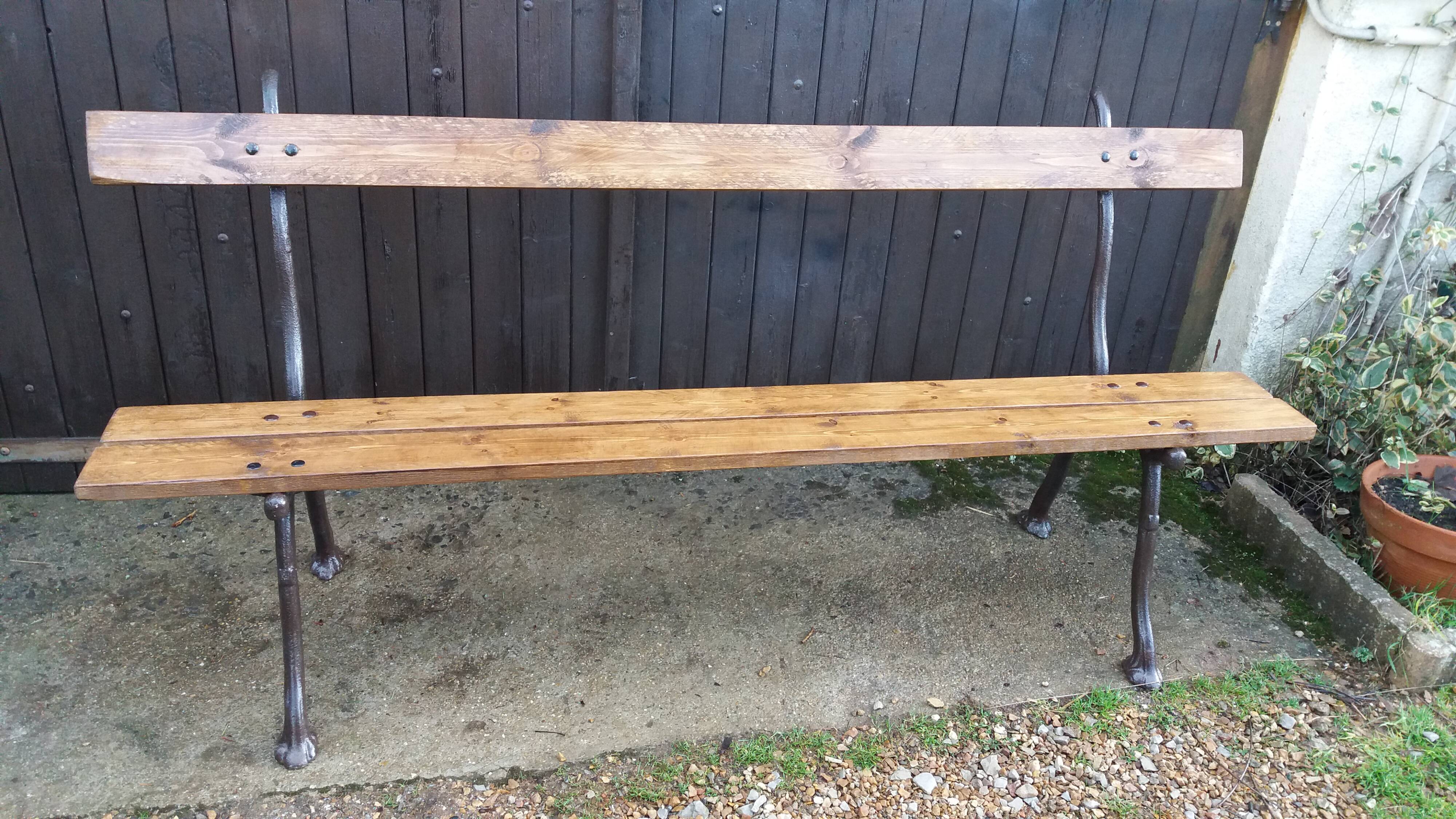 Cast iron leg garden bench