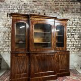 Projection bookcase in flamed mahogany from the 19th century