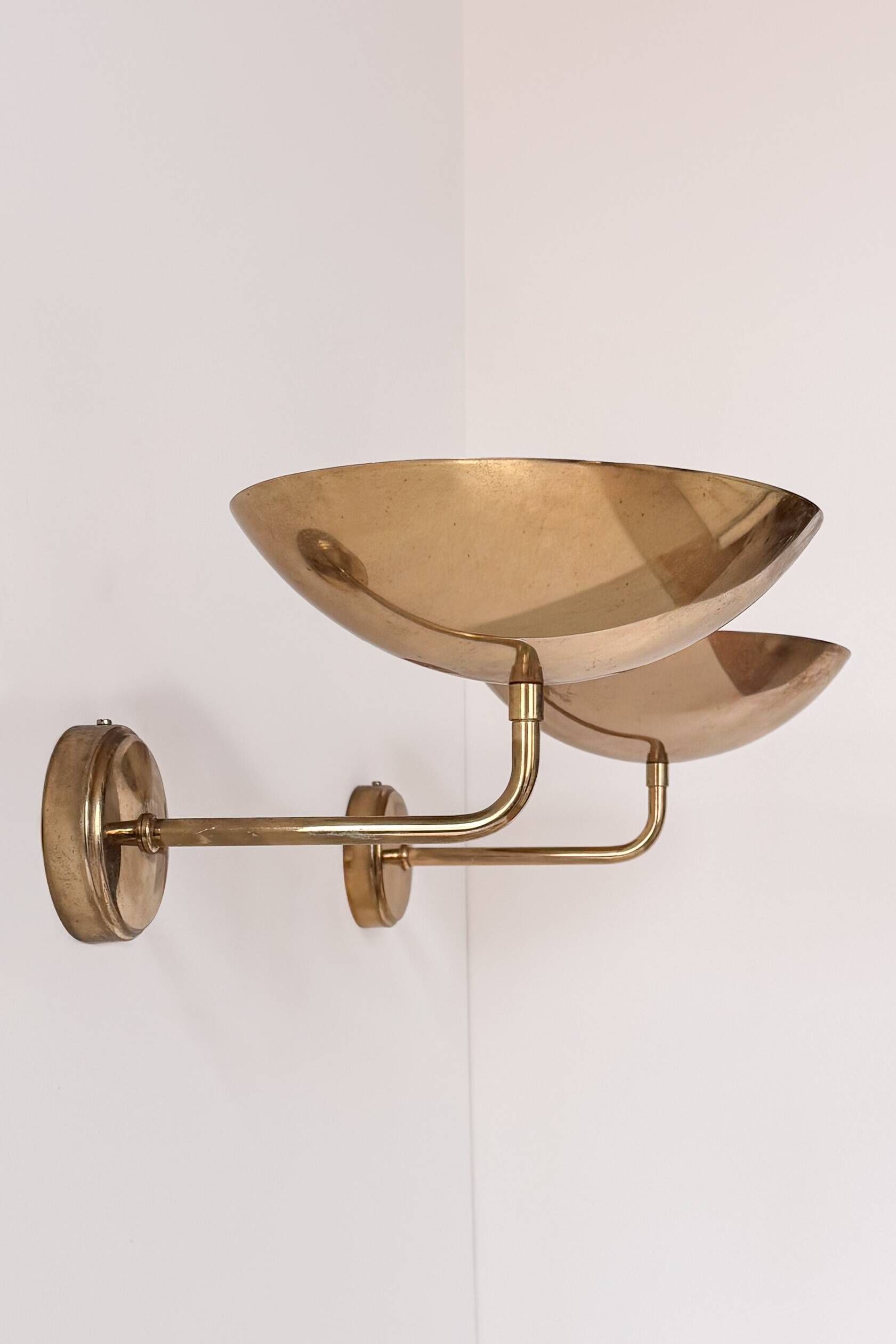 Pair of vintage wall lights, patinated brass, France 1970.