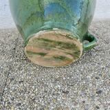 Antique glazed green terracotta oil jar, late 19th century.