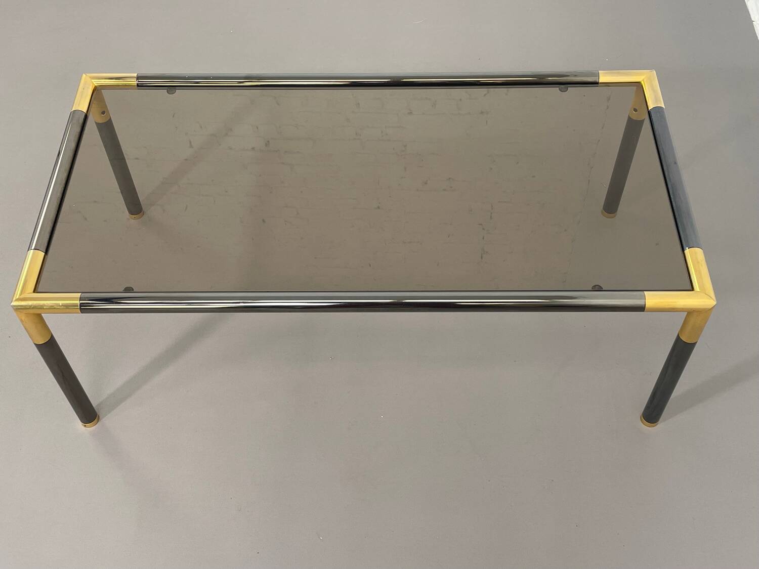 Gunmetal gold metal and smoked glass coffee table from the 70s
