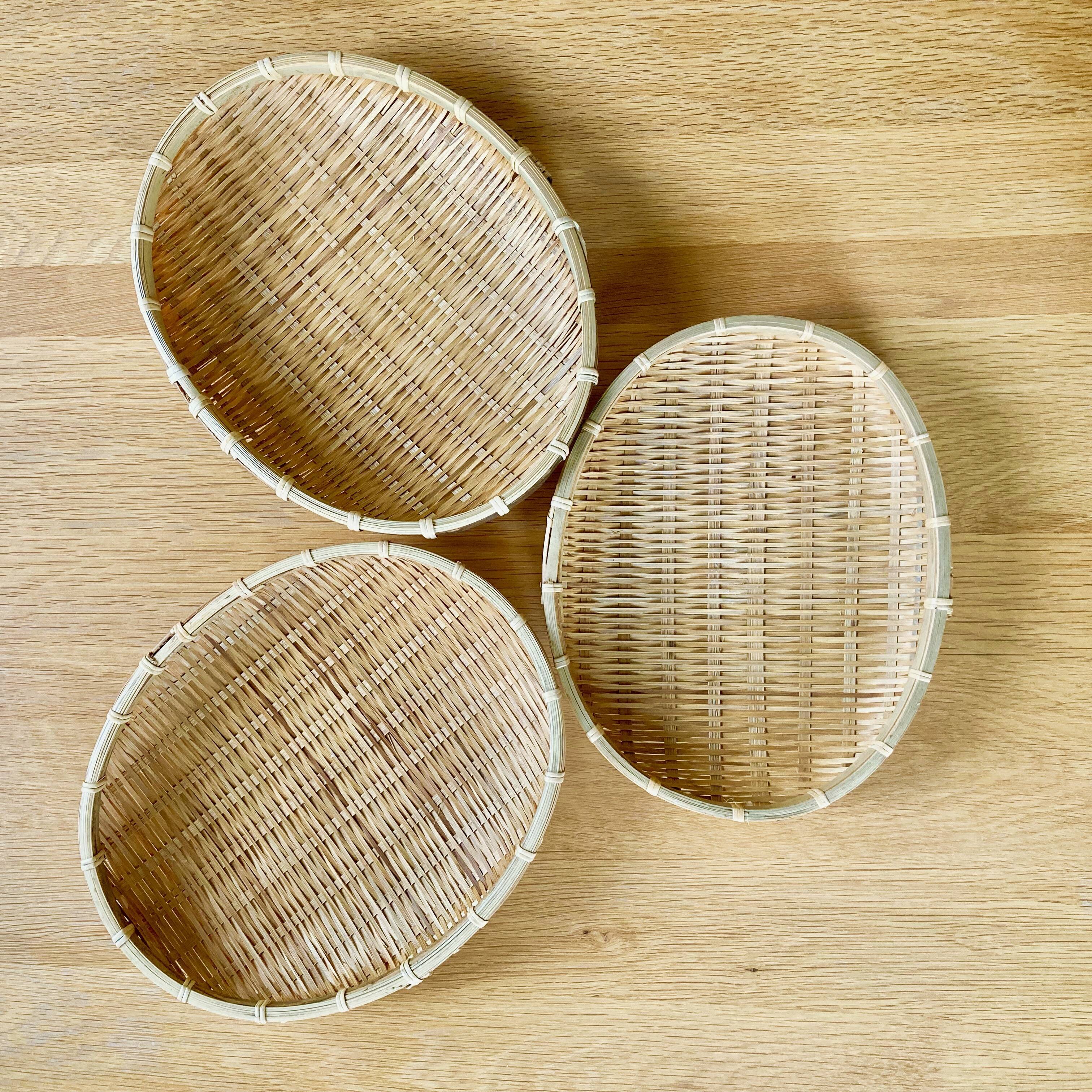 Three trundle baskets