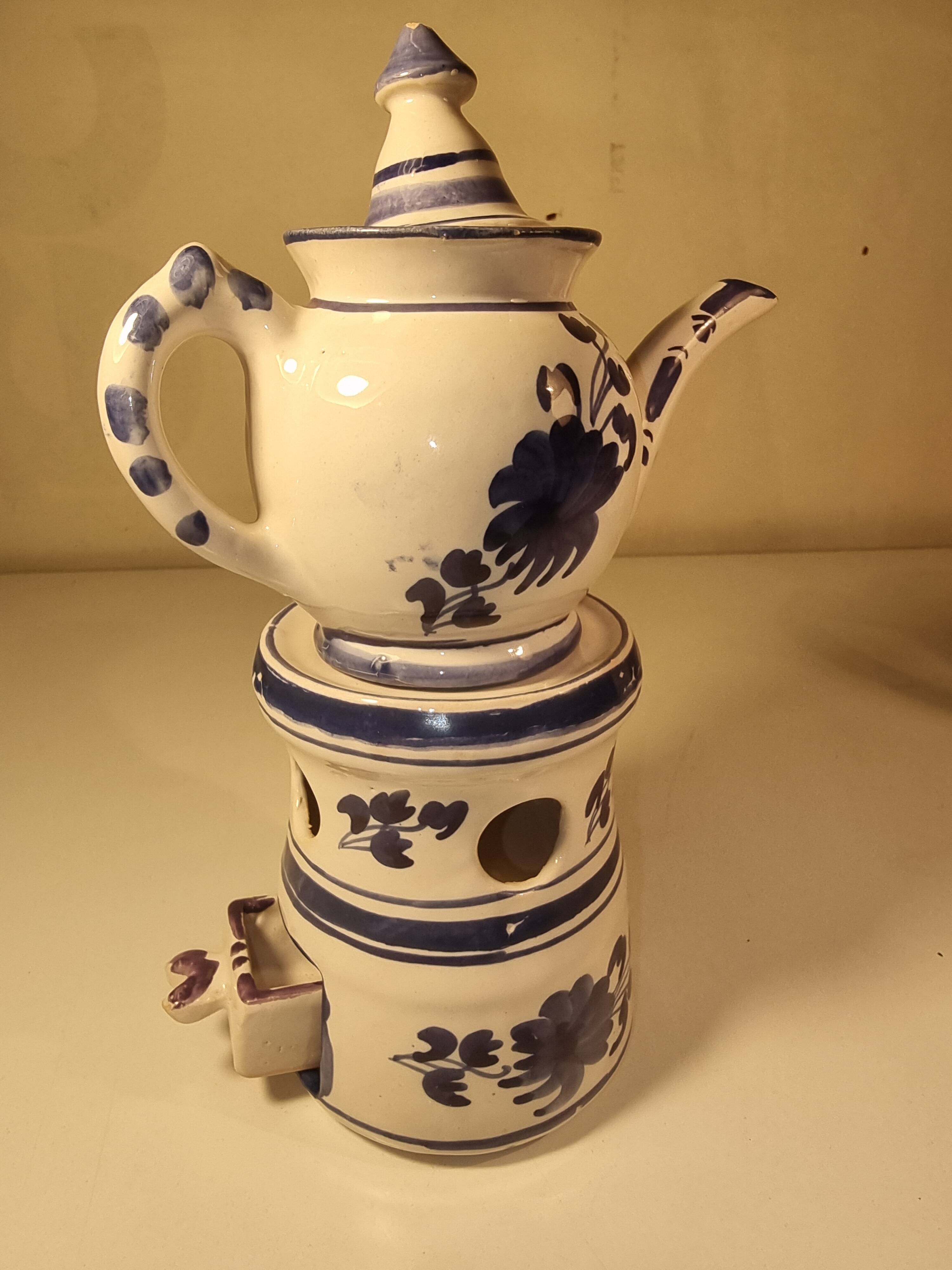 Vintage teapot in earthenware