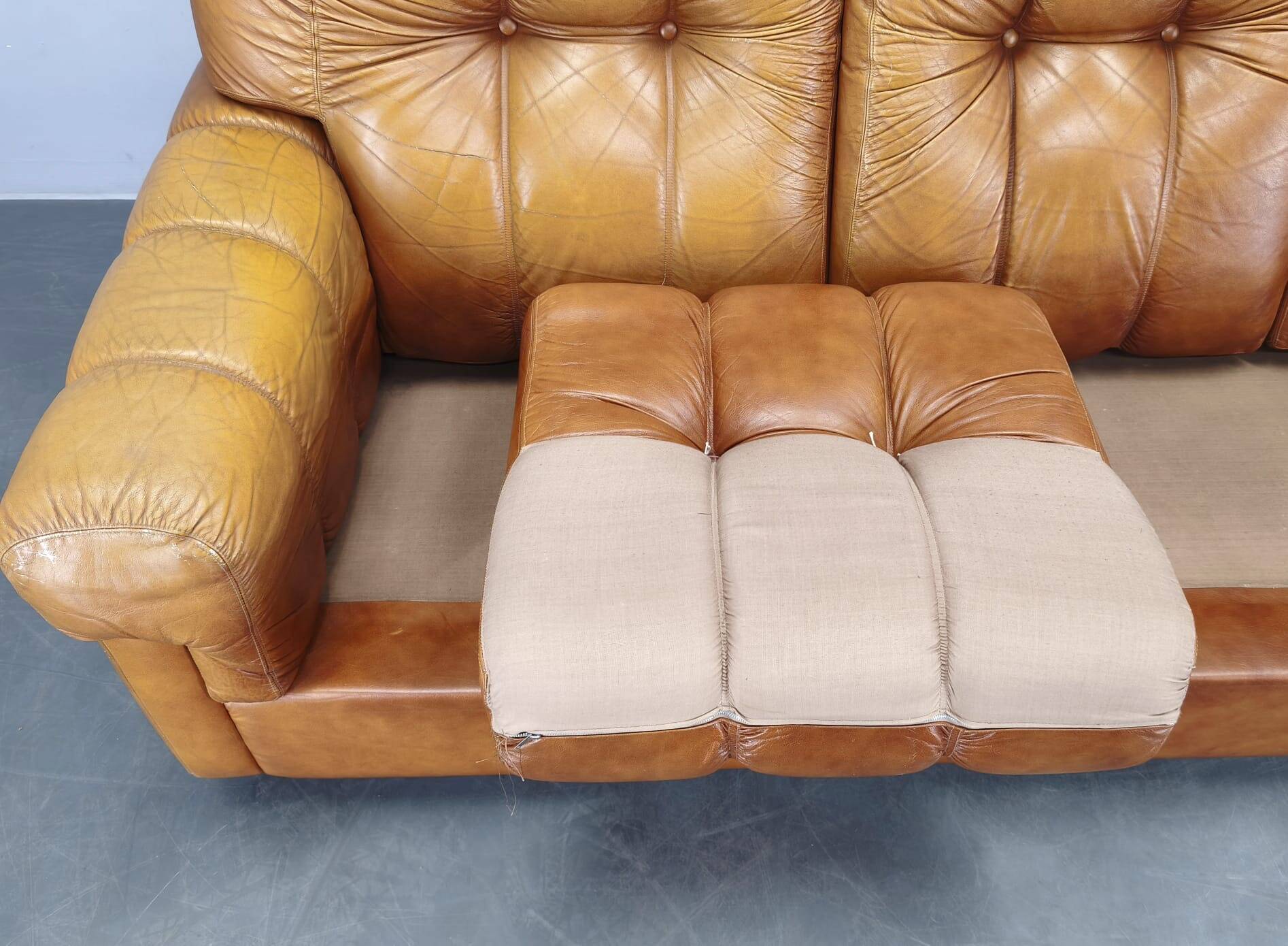 Three-seater sofa from the mid-century produced in Italy in the 1970s.
