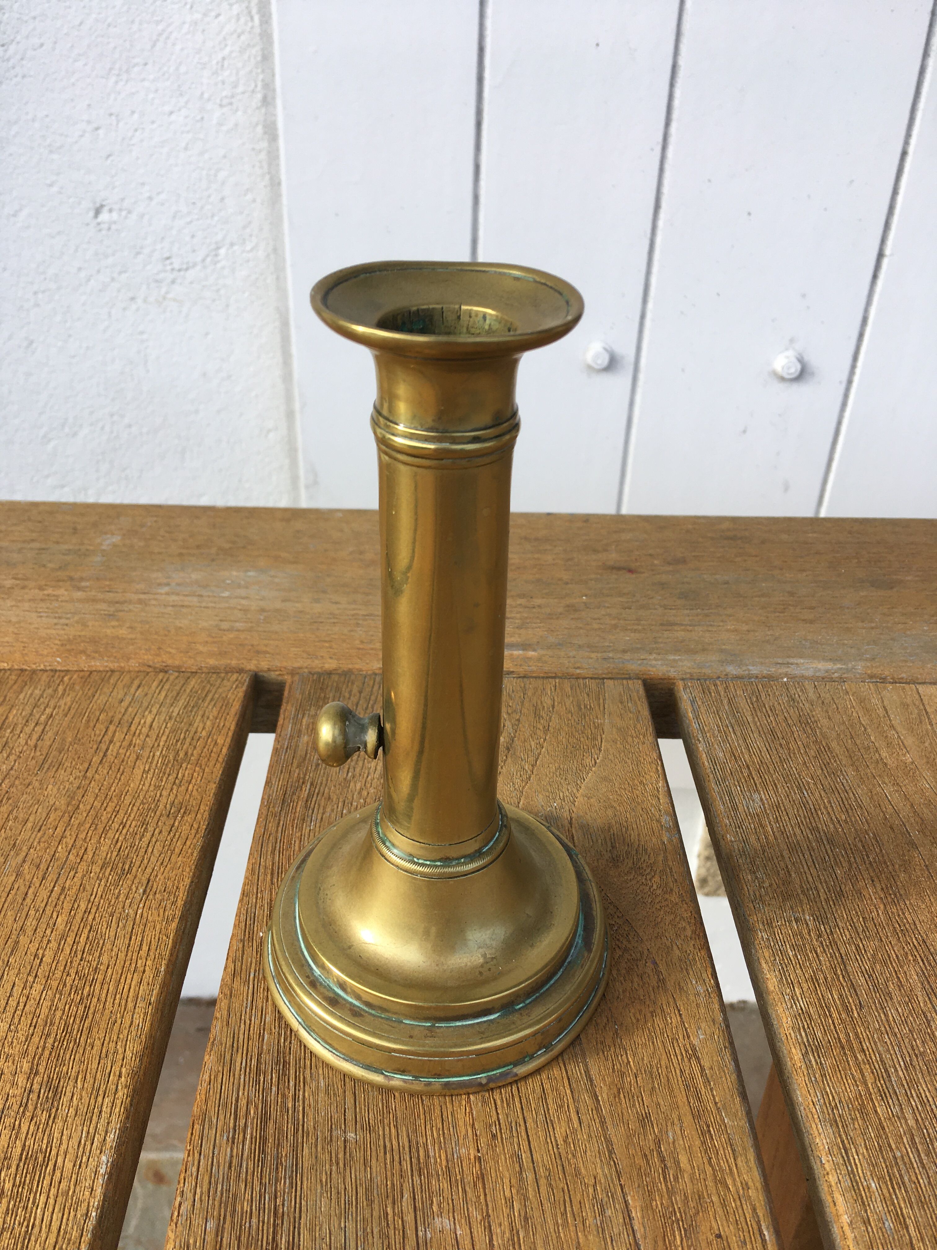 Brass pusher candle holder