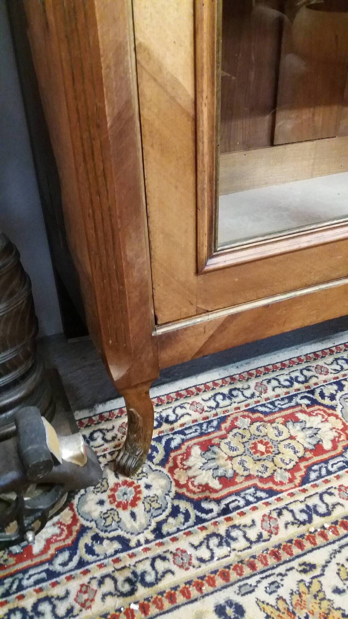 Two-door display cabinet in transitional style.