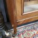 Two-door display cabinet in transitional style.