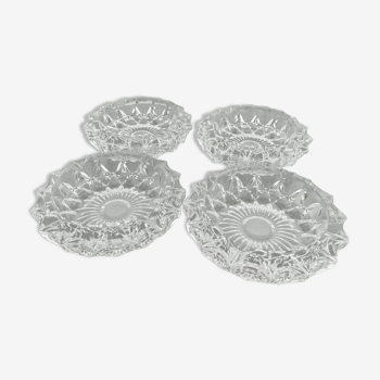 Set of 4 identical glass ashtrays