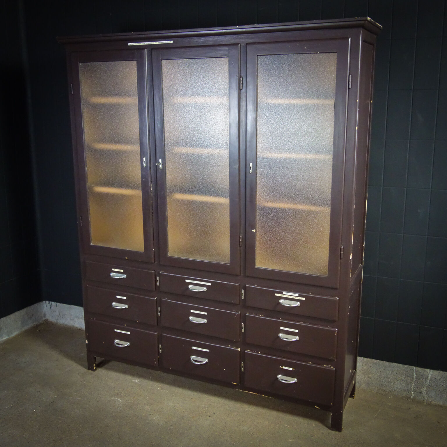 Medical display cabinet with drawers 1950