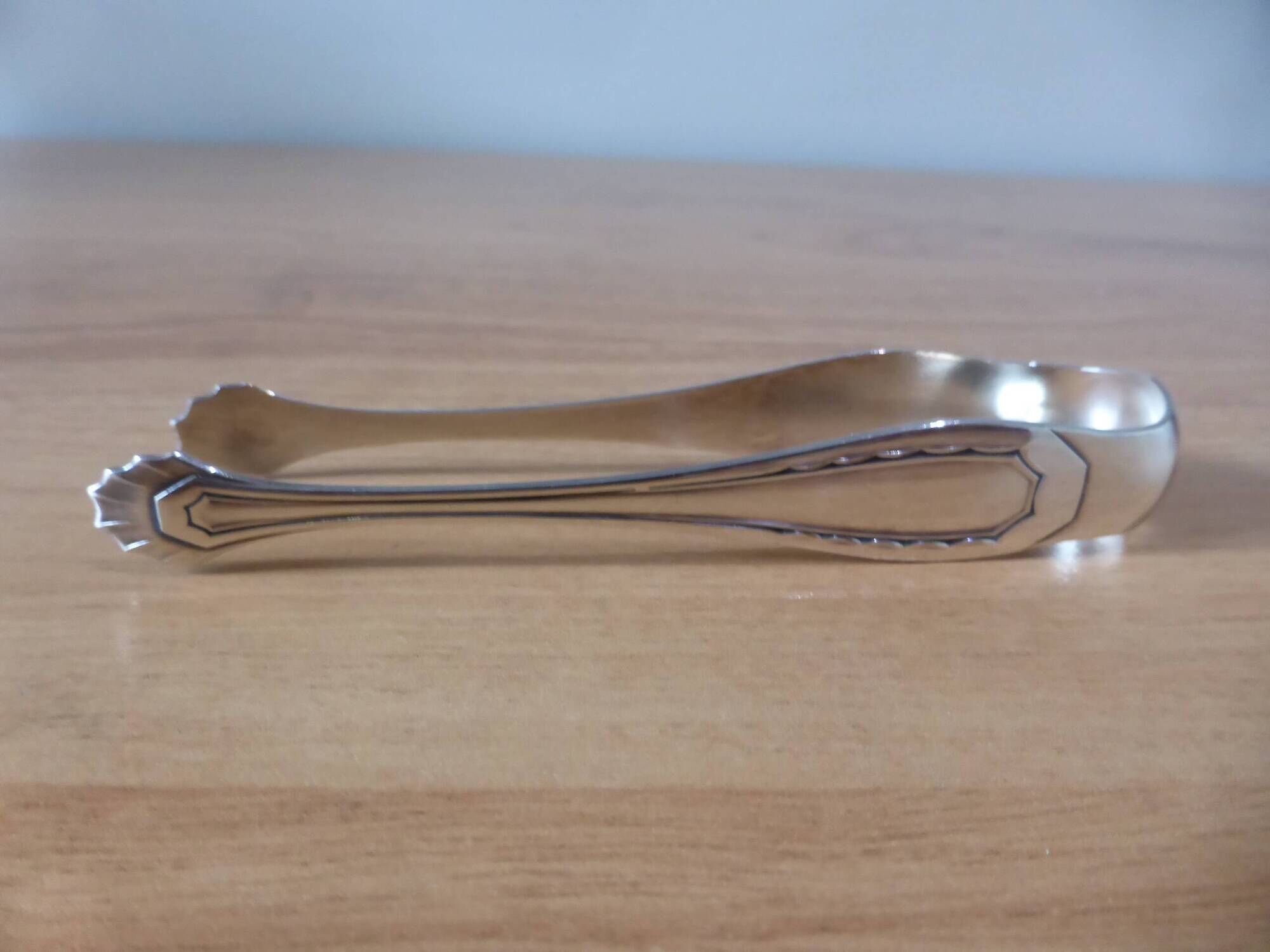vintage silver metal sugar tongs