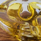 Vintage ashtray in yellow and transparent molded glass