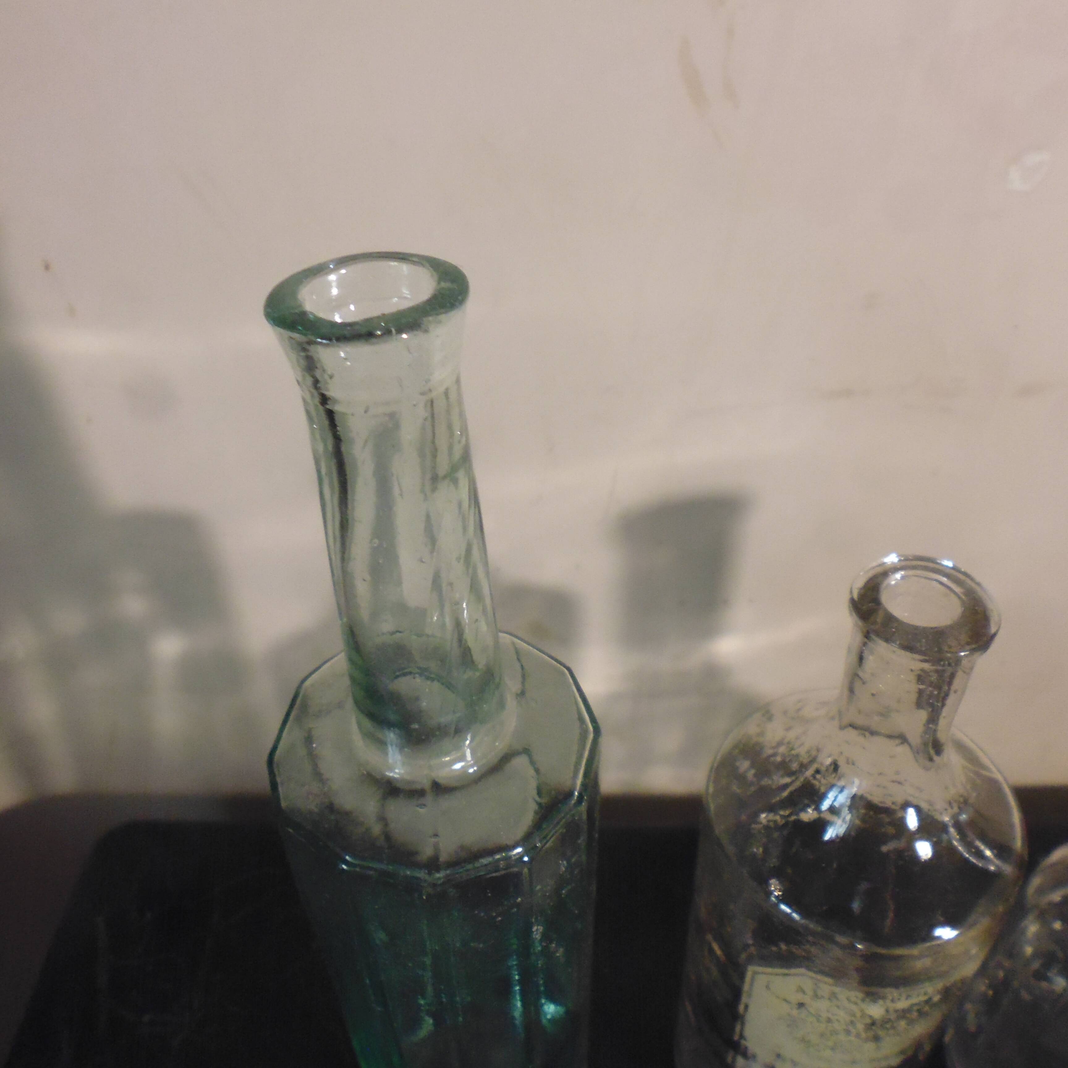 3 old blown glass bottles