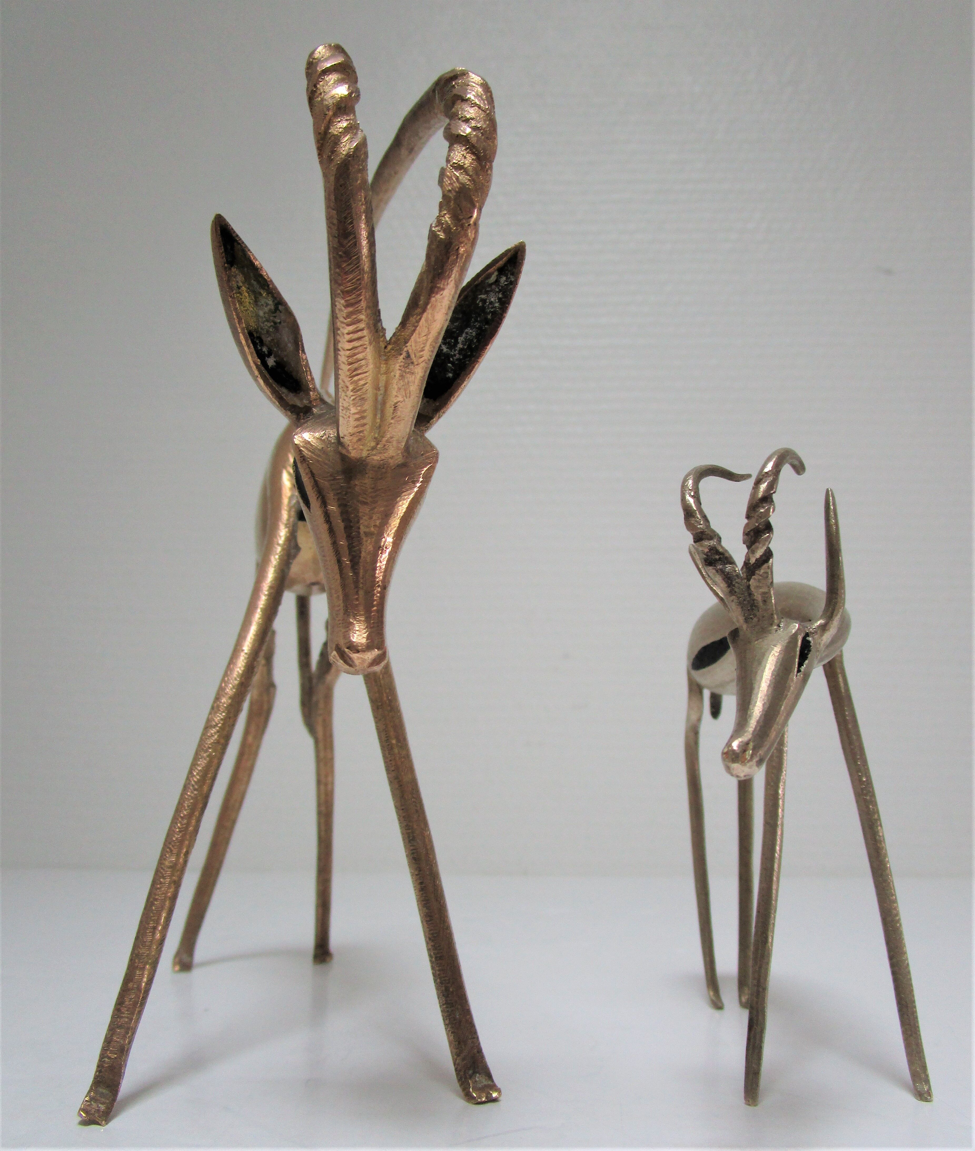 Four vintage brass antelope gazelles