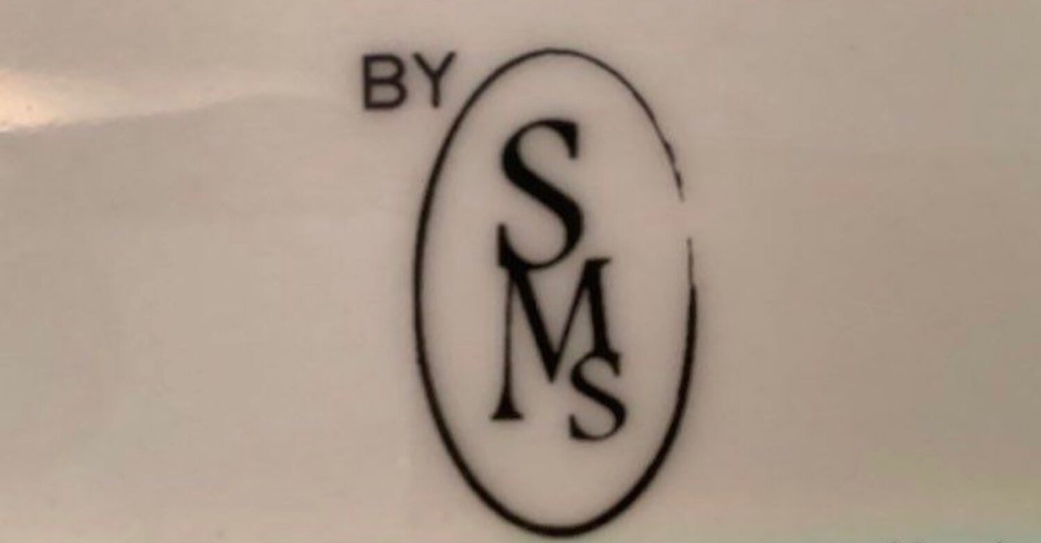 Cake dish with fuchsia orchids