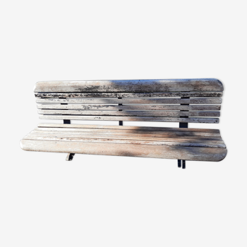 Public bench in wooden slat and cast iron