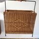 large wicker / rattan and black iron magazine rack from the 70s