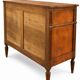 Light walnut commode in Louis XVI style with fluted motifs and three drawers.