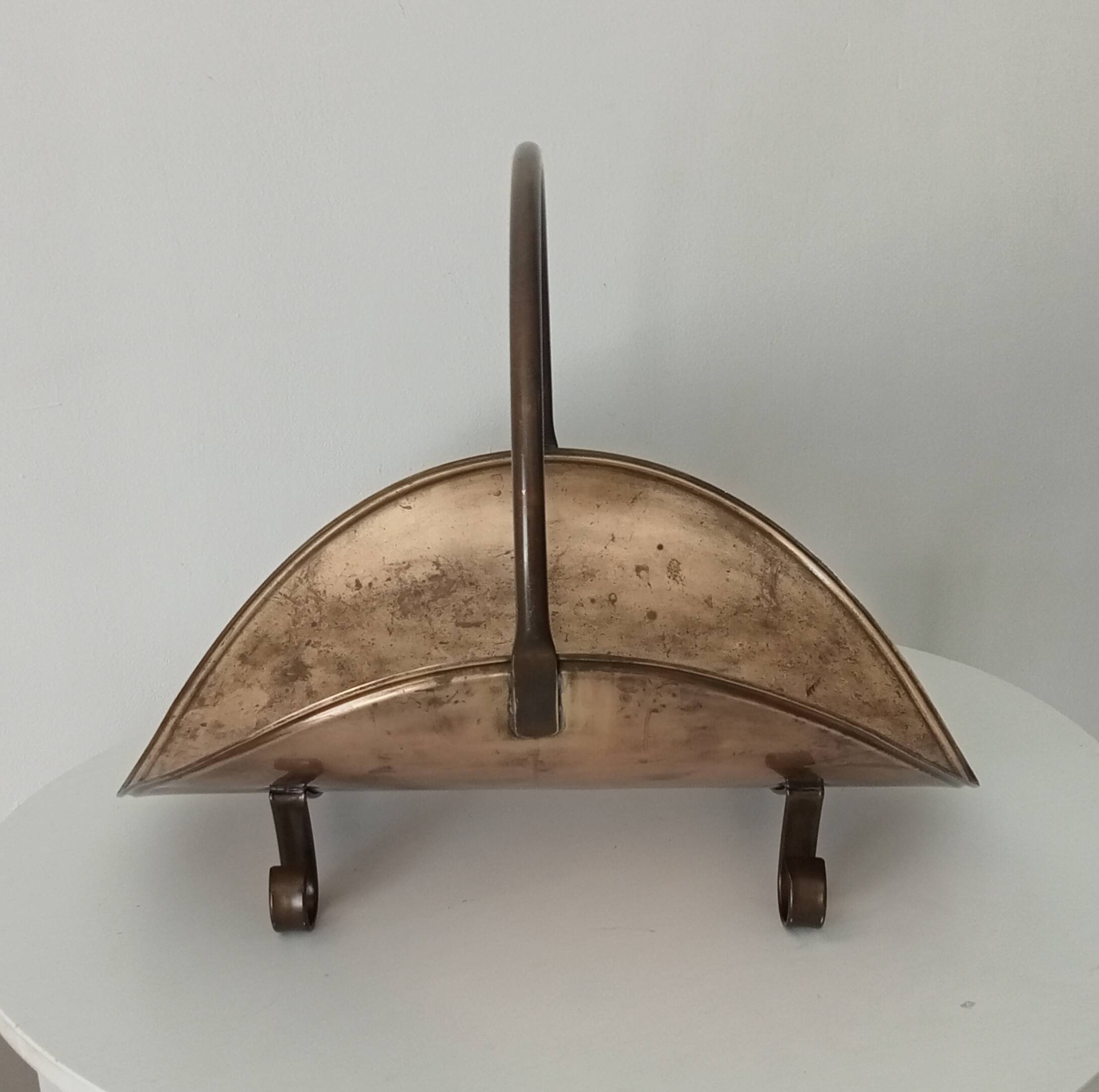 Old brass log holder