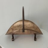 Old brass log holder