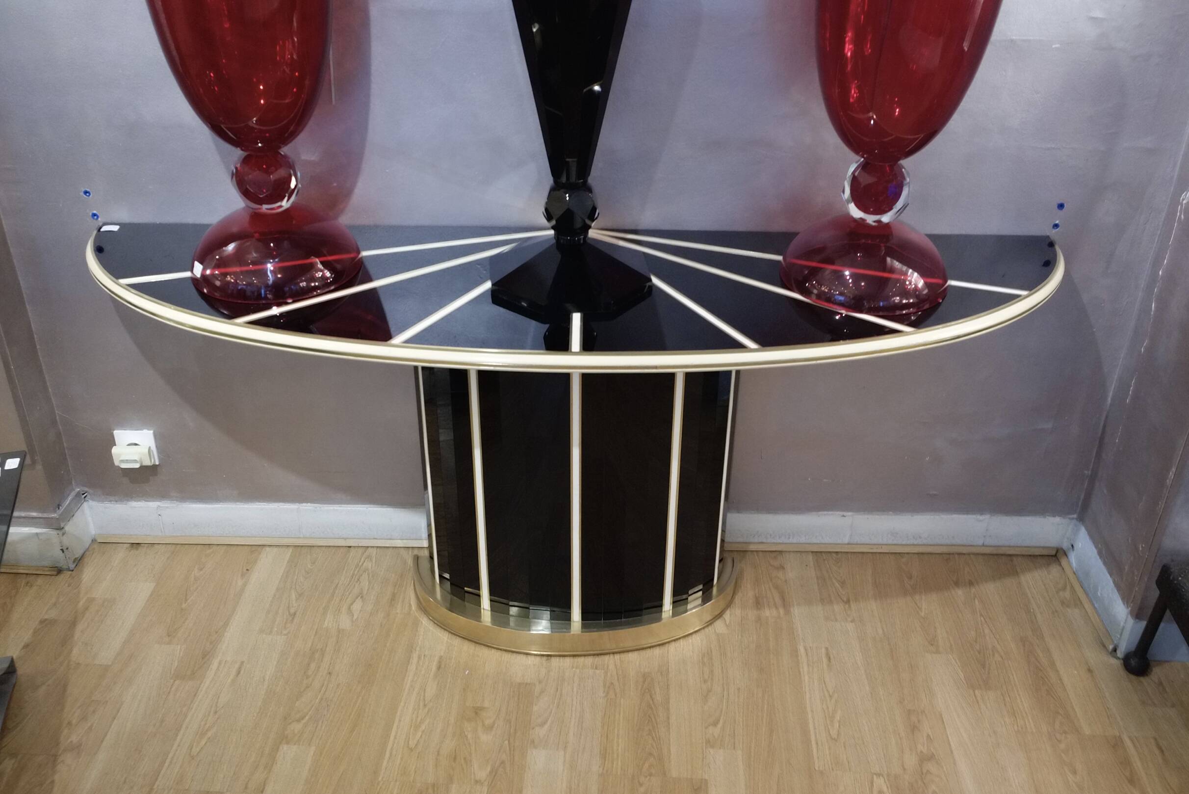 Console in black and cream tinted glass