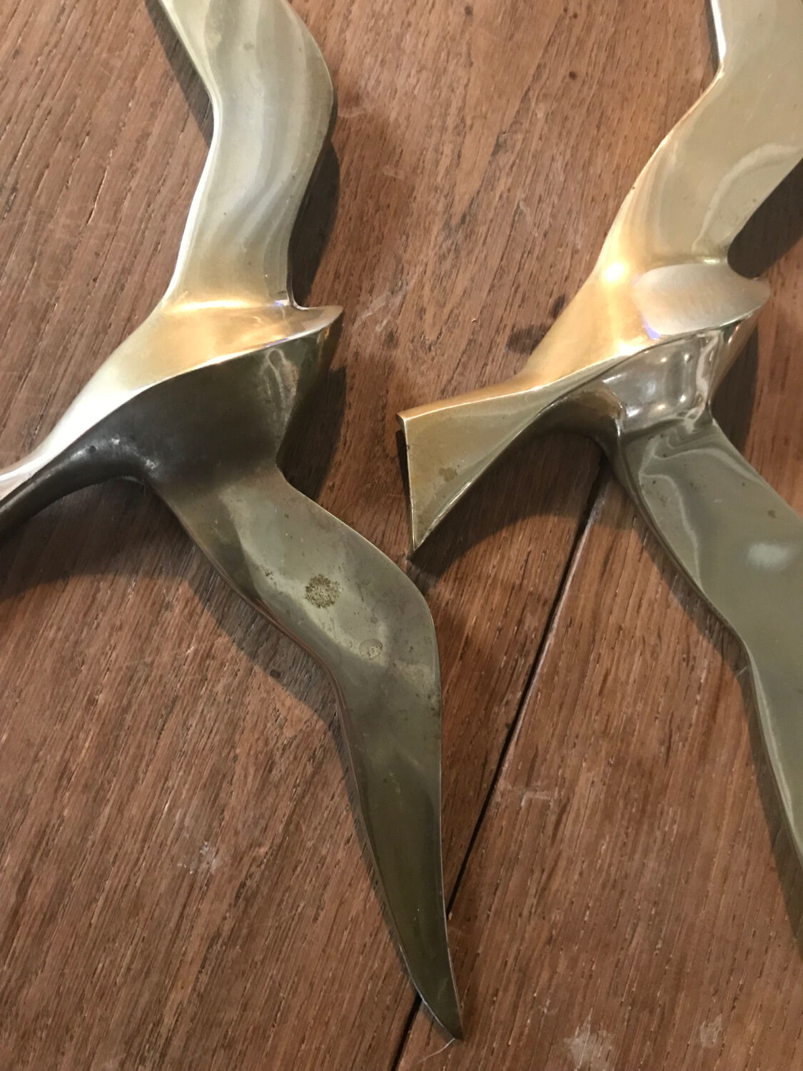 Pair of brass swallows