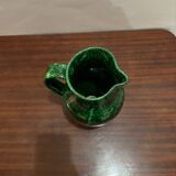 Green glazed ceramic pitcher