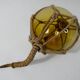 Boule de verre flotteur jaune ambré vintage