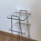 Chrome and glass side table. 1970s. Space Age.