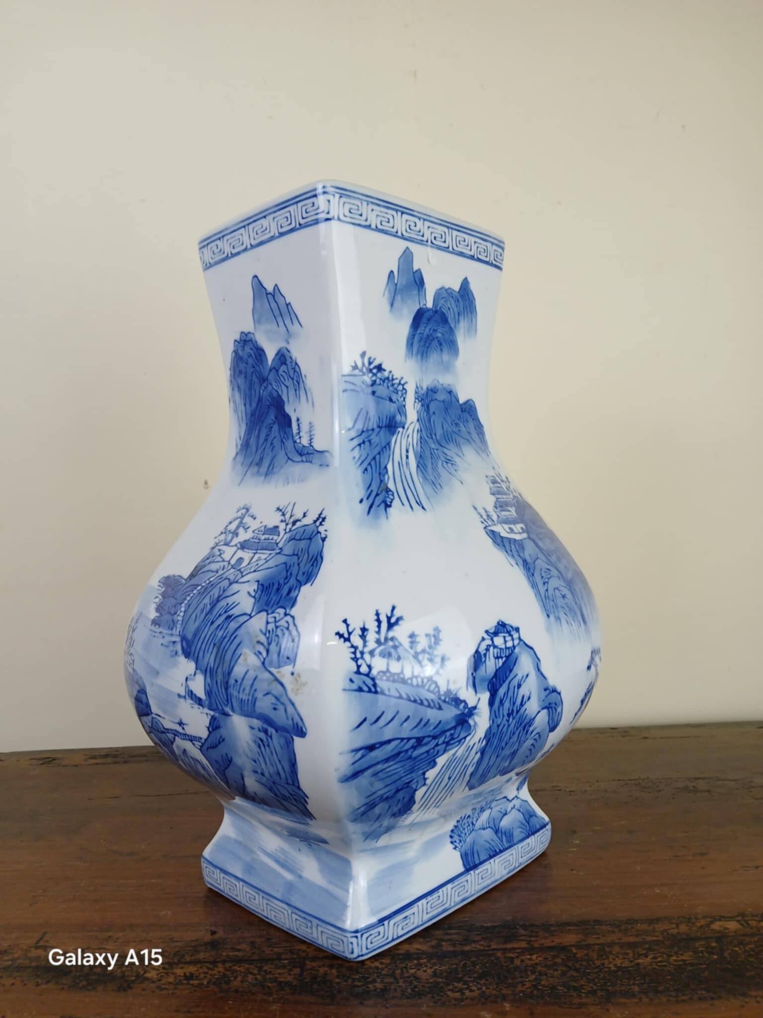 China circa 1920: porcelain vase with blue and white decoration