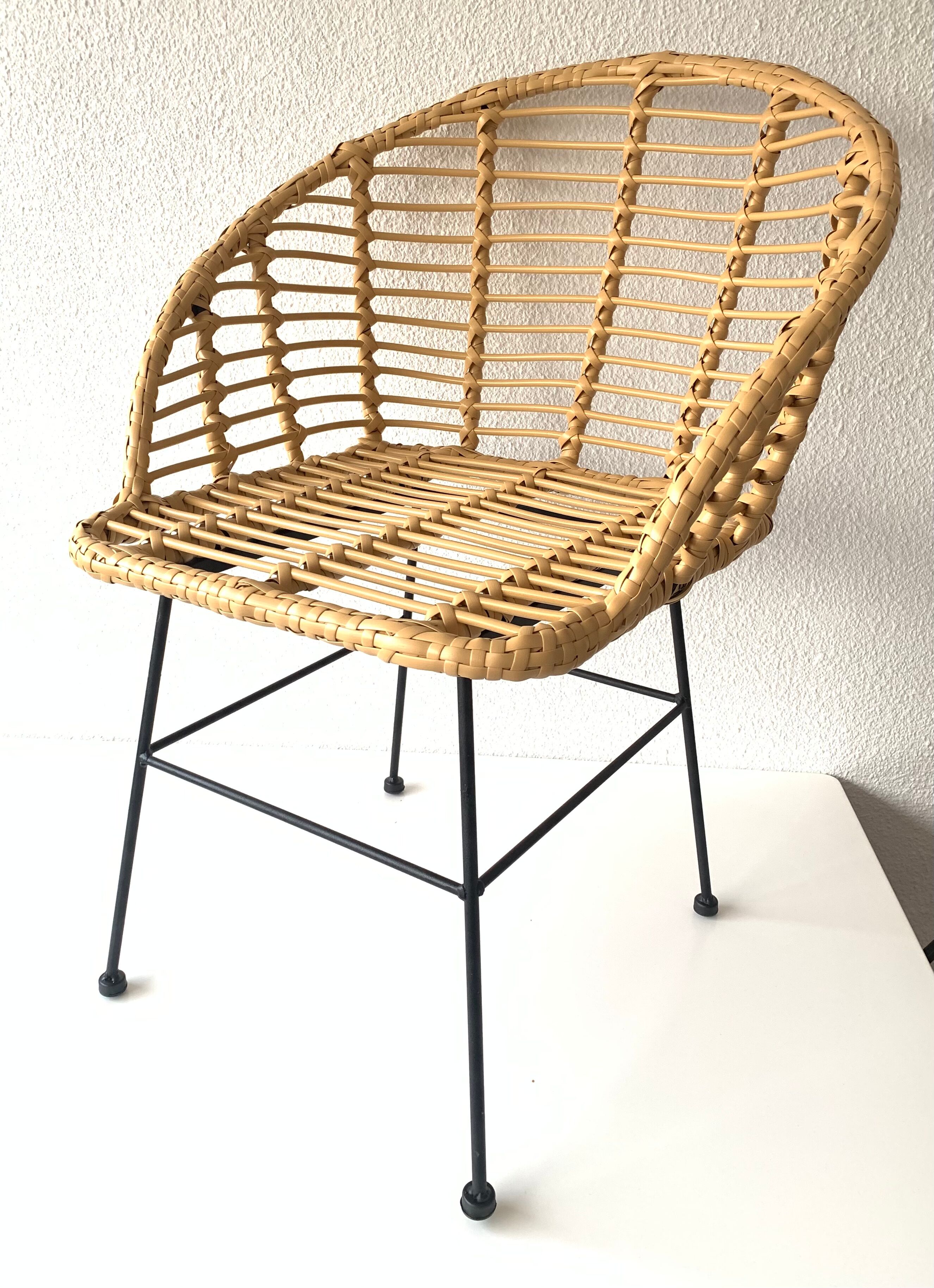Natural coloured rattan resin armchair