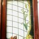 Pair of art deco doors in glass painted in imitation of 20th century stained glass