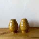 Salt and pepper in saffron yellow ceramic