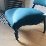 Velvet and studded armchair