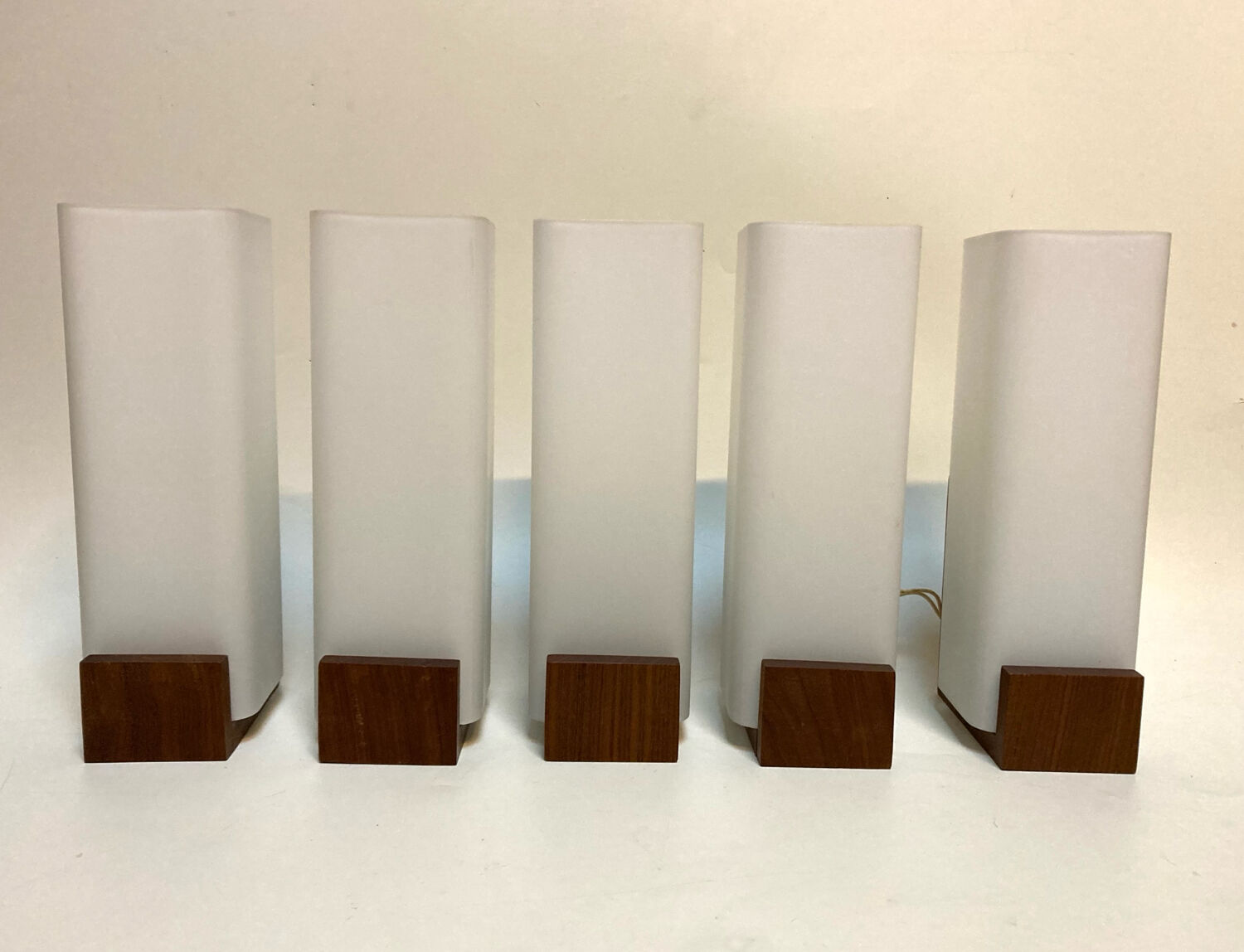 Many Louis Kallf wall lights.